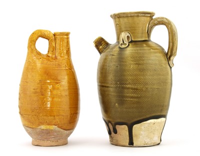 Lot 361 - Two Chinese pottery ewers