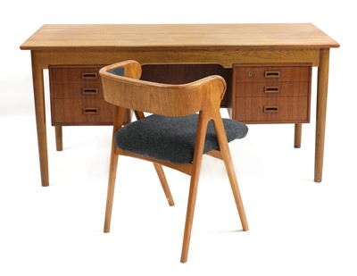 Lot 322 - A Danish teak and oak desk