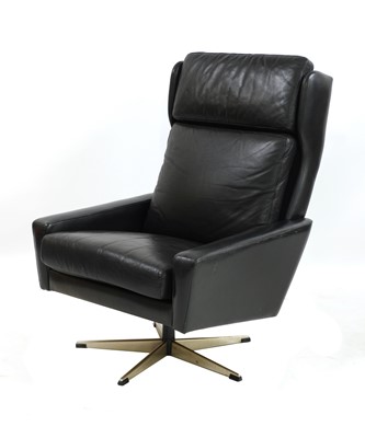 Lot 319 - A Danish high back black leather swivel chair