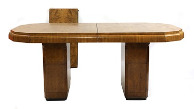 Lot 97 - An Art Deco burr walnut extending dining table