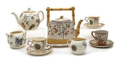 Lot 279 - An Aesthetic Period moulded stoneware teapot