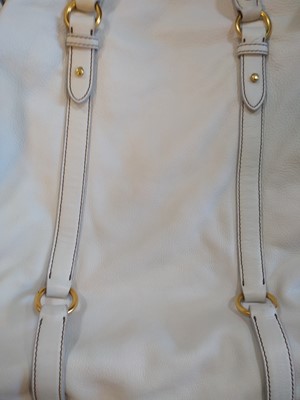 Lot 84 - A Miu Miu white leather 'Vitello Lux' fold-over top hobo bag