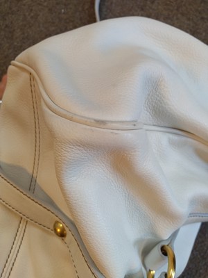 Lot 84 - A Miu Miu white leather 'Vitello Lux' fold-over top hobo bag