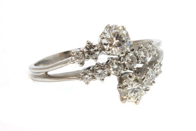 Lot 268 - An Italian white gold diamond set crossover ring