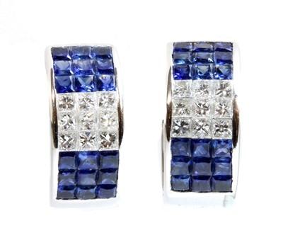 Lot 459 - A pair of white gold sapphire and diamond hinged hoop earrings