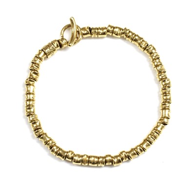 Lot 292 - An 18ct gold 'Allsorts' bracelet by Links of London, c.2011