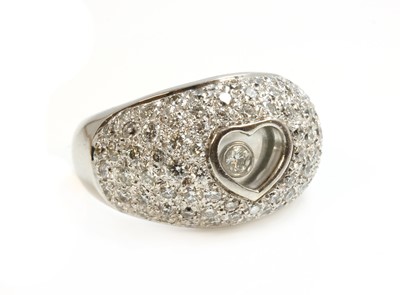 Lot 373 - An 18ct white gold diamond set bombé ring