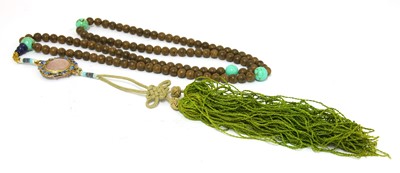 Lot 376 - A Chinese wood bead rosary