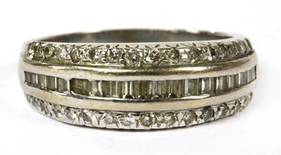 Lot 238 - An 18ct white gold three row diamond ring