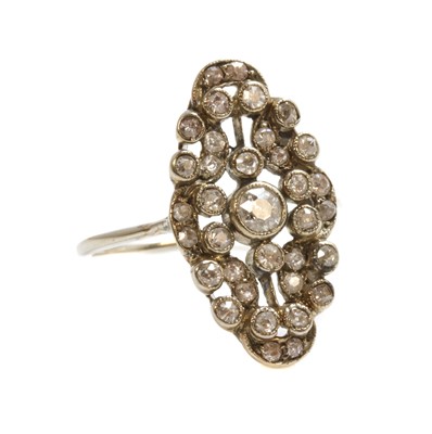 Lot 147 - A Continental diamond set navette-shaped plaque ring