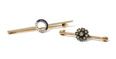 Lot 28 - A diamond and sapphire bar brooch