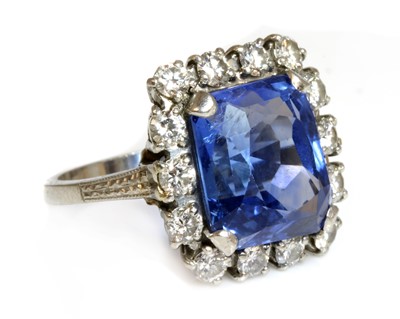 Lot 105 - An American sapphire and diamond cushion-shaped cluster ring