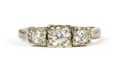 Lot 224 - A 9ct white gold three stone diamond ring