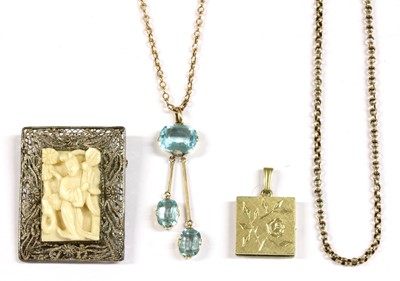 Lot 386 - A gold paste négligée pendant