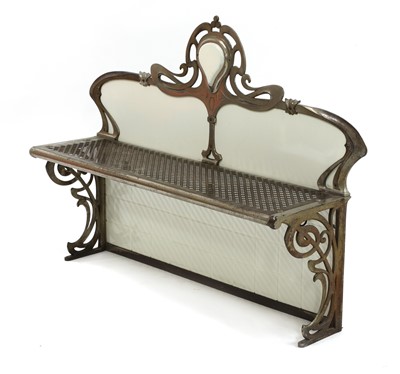 Lot 13 - A French Art Nouveau metal and enamelled wall shelf
