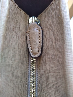 Lot 77 - A Coach tan leather tote bag