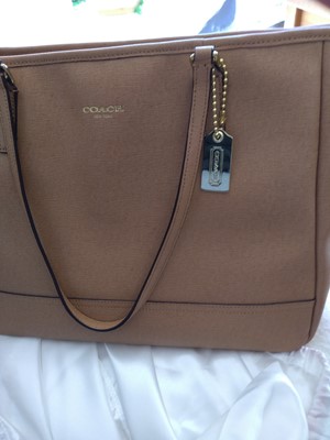 Lot 77 - A Coach tan leather tote bag