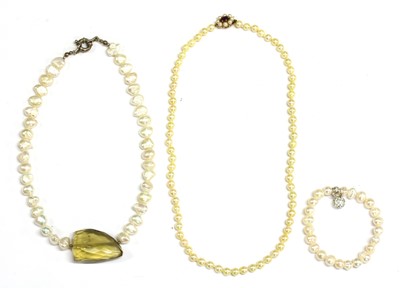 Lot 339 - A single row uniform cultured pearl necklace