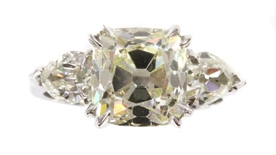 Lot 40 - An 18ct white gold three stone diamond ring