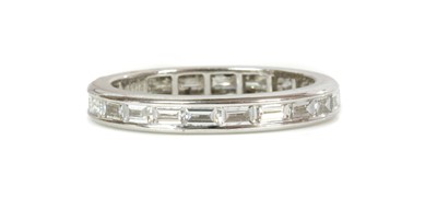 Lot 406 - An 18ct white gold diamond set full eternity ring