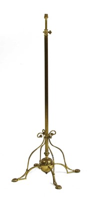 Lot 21 - An Arts and Crafts brass standard lamp