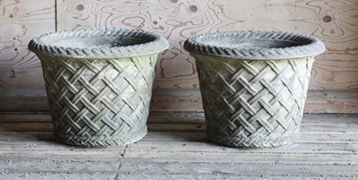Lot 983 - A pair of Haddonstone garden urns