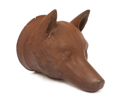 Lot 152 - A rare Staffordshire redware fox mask stirrup cup