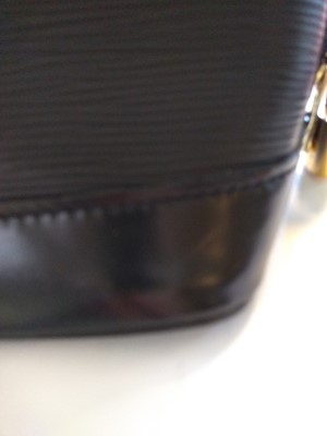 Lot 6 - A Louis Vuitton black Epi leather Alma bag