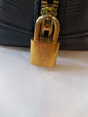Lot 6 - A Louis Vuitton black Epi leather Alma bag
