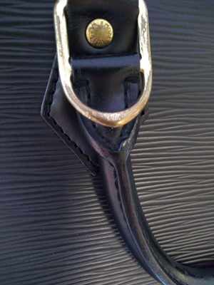 Lot 6 - A Louis Vuitton black Epi leather Alma bag