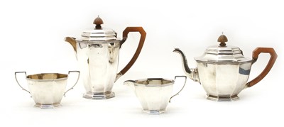 Lot 18 - A George VI silver four piece tea set, of octagonal design by Adie Bros Ltd