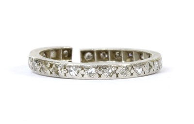 Lot 61 - A platinum diamond eternity ring