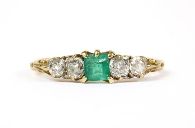 Lot 215 - A gold emerald and diamond ring