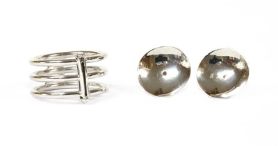 Lot 372 - A white gold three row dress ring