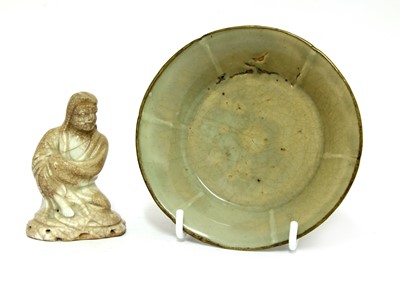 Lot 96 - A Chinese porcelain figure