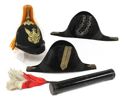 Lot 805 - An American Artillery blue cloth, spiked, pith helmet with plume