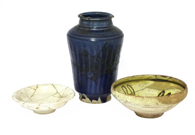 Lot 189 - A yellow and brown glazed shallow dish