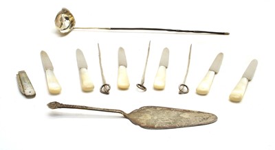 Lot 41A - A silver cake slice by Reid & Sons