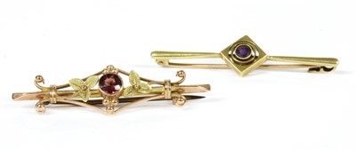 Lot 24 - An Edwardian gold amethyst bar brooch