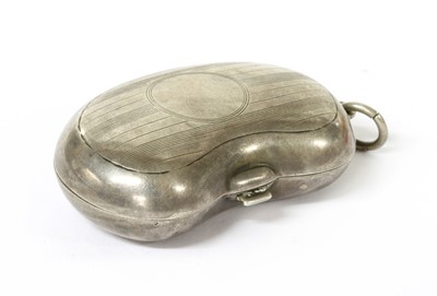 Lot 280 - A sterling silver kidney-shaped twin section sovereign holder