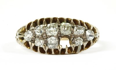 Lot 11 - A gold boat shaped diamond ring