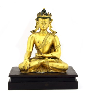 Lot 214 - A Chinese gilt-bronze Shakyamuni Buddha
