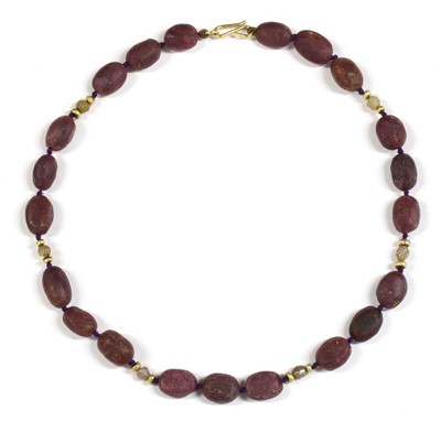 Lot 231 - A gold ruby and diamond necklace