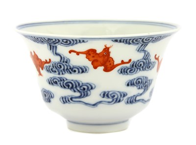 Lot 149 - A Chinese blue and iron-red cup
