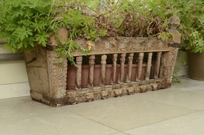 Lot 9 - A carved hardwood manger/plant stand