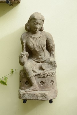 Lot 11 - A carved sandstone figure of a dancer