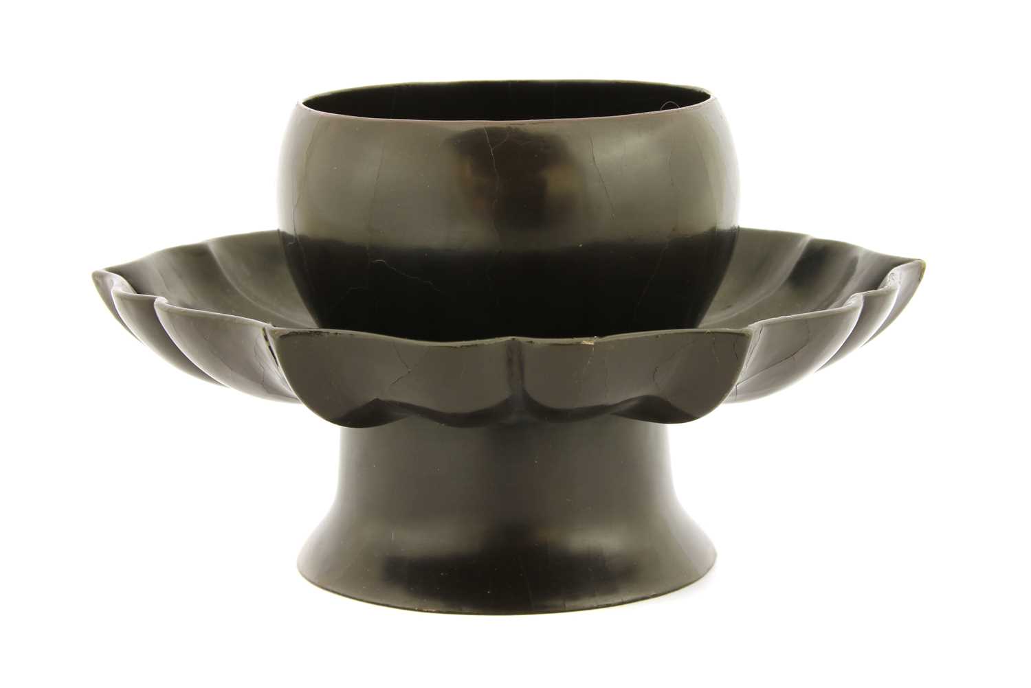 Lot 252 - A Chinese brown-lacquered cup stand