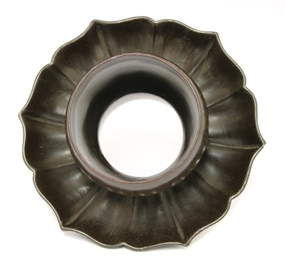 Lot 252 - A Chinese brown-lacquered cup stand