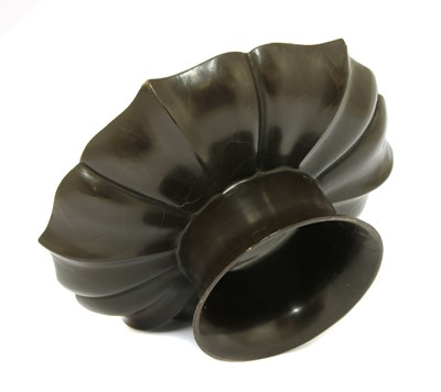 Lot 252 - A Chinese brown-lacquered cup stand