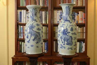 Lot 102 - A near pair of celadon-glazed vases